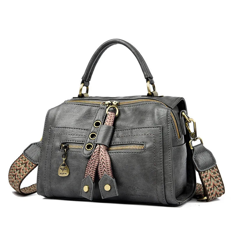 Soft grey PU women's crossbody bag with a square shape and an external sandwich pocket.