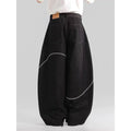 Black straight-leg denim trousers with a mid waist and zip fly, laid flat.