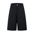 Retro loose fit wide leg denim middle pants in black and green colours on a hanger