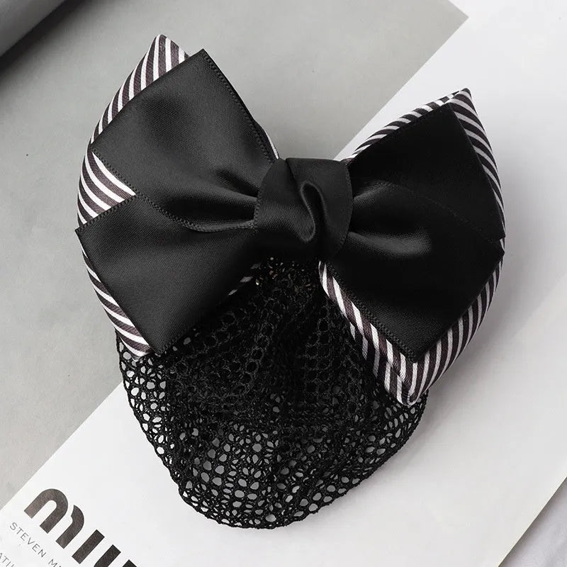 Professional hair clip with a black net pocket and a red flower bow ornament on a white background.