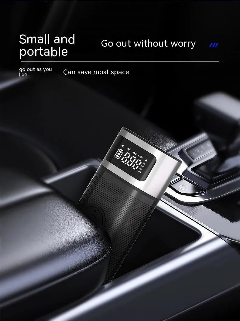 Black portable wireless smart vehicle air pump with LED light and multiple inflation nozzles
