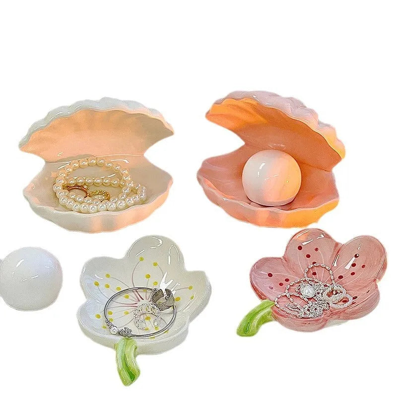 White porcelain ornament board with integrated small night lamp and storage tray for jewellery.