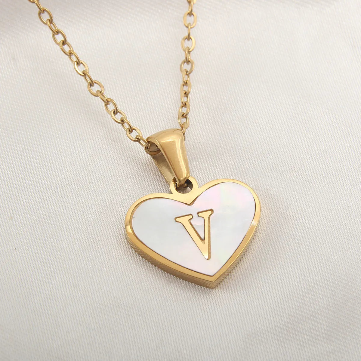 Gold plated personalised heart necklace with white shell on a 45cm chain