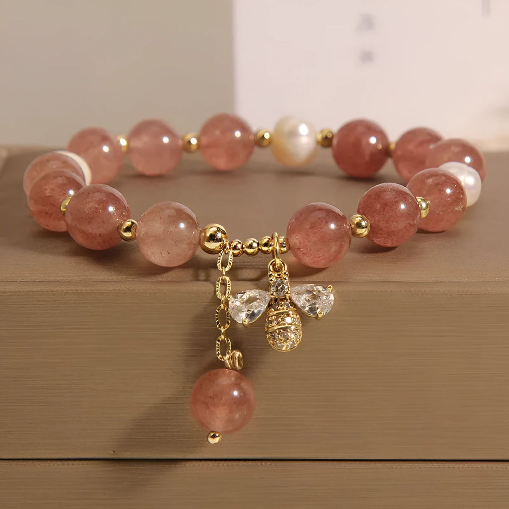 Freshwater pearl and strawberry quartz bracelet with zircon flower charms