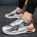 Men's grey breathable mesh casual running shoes with a round toe and EVA sole on a white background.