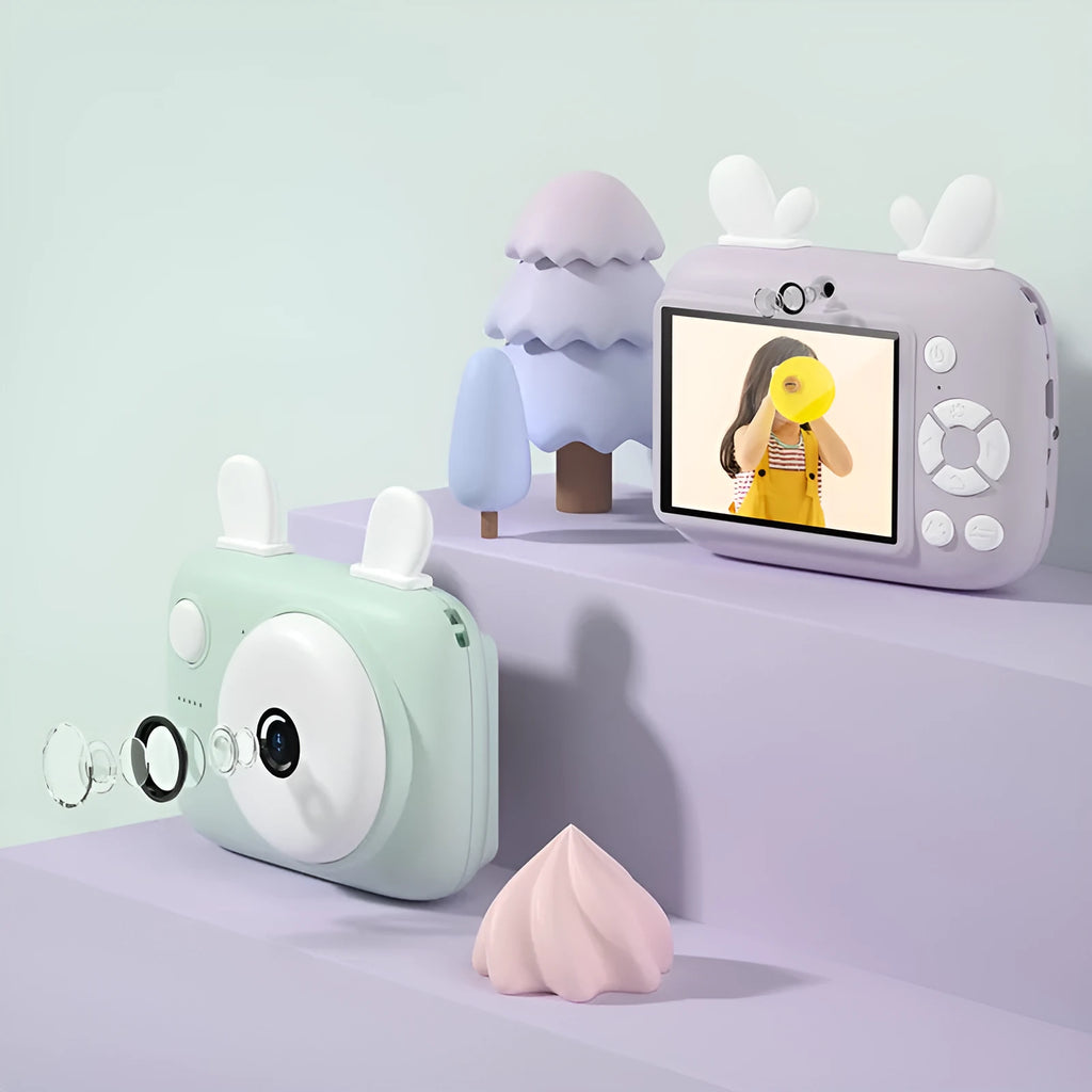A2 Kids Macaron Mini SLR digital camera in green, showing front and rear lenses and colour screen.