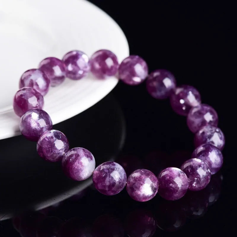 Grandmother Crystal purple bracelet with geometric beads in a single circle on a white background.