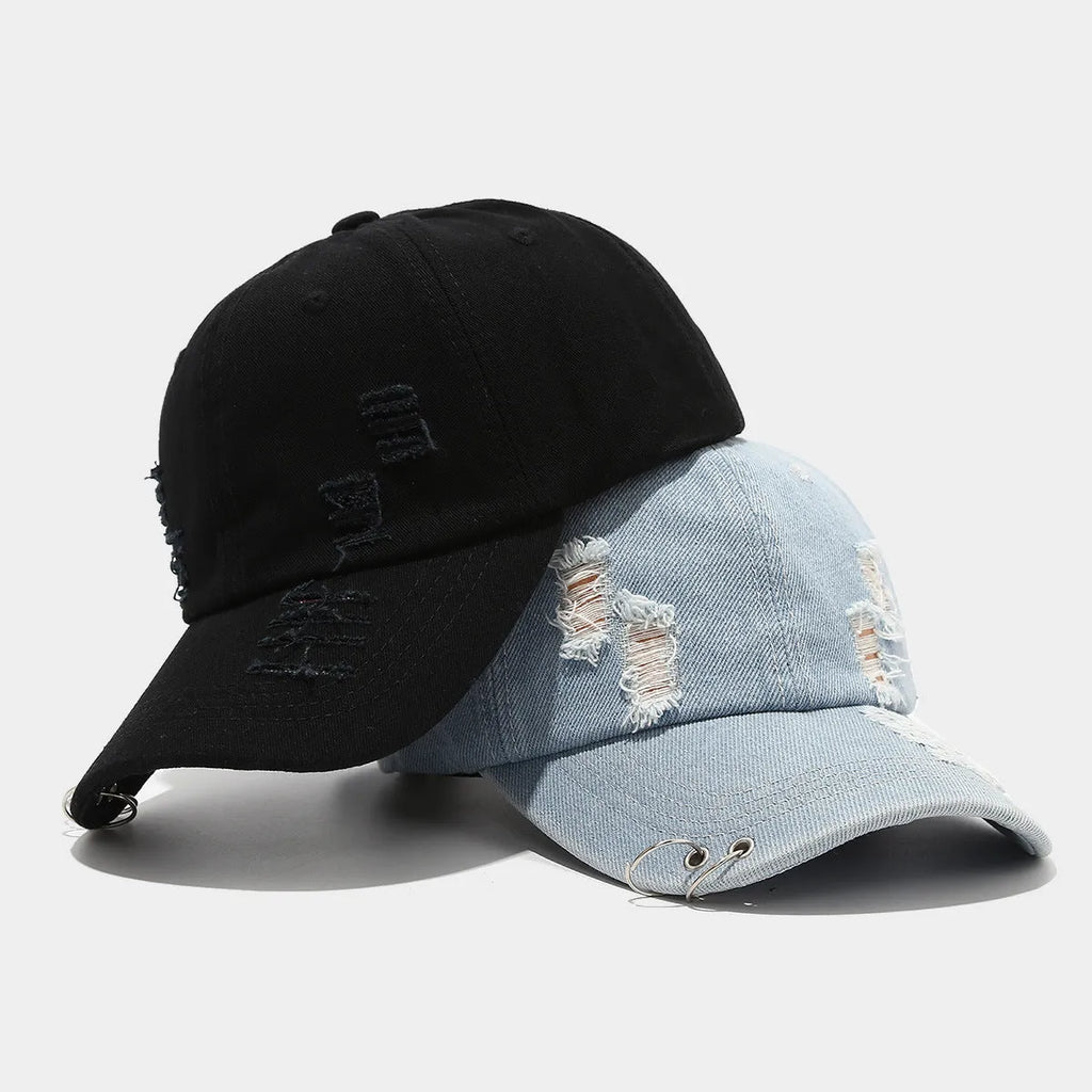 Men's black denim peaked cap with a dome crown on an adjustable strap.