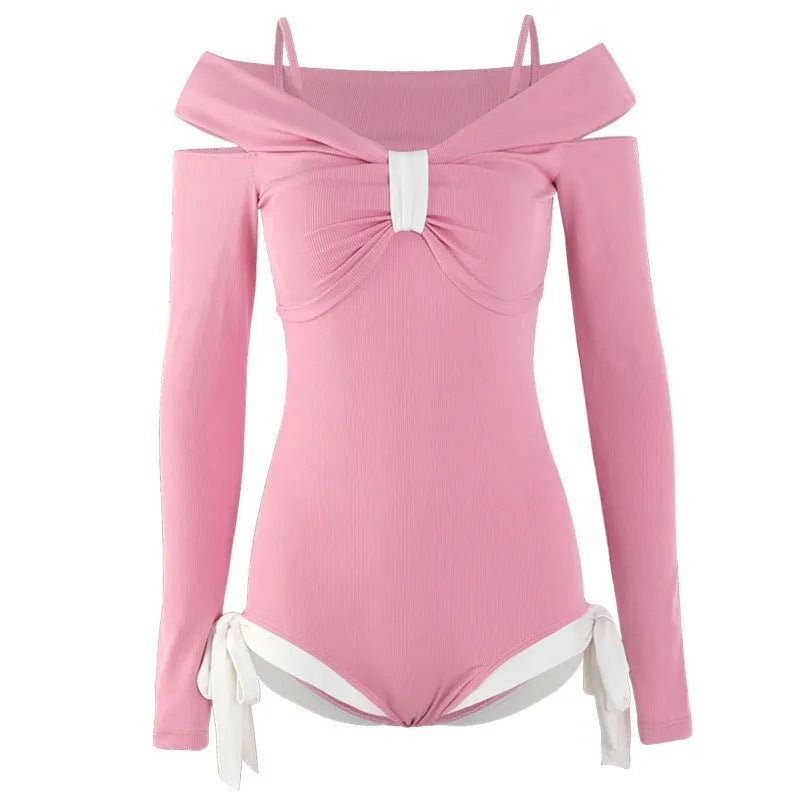 Women's long sleeve one-piece swimsuit in black or pink colours with polyester fibre construction