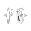 Minimalist star design ear clips in sterling silver with oxidised finish and XINGX elements