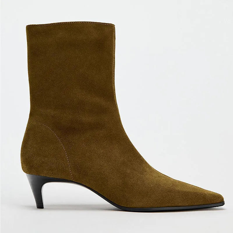 Brown square toe ankle boot with side zip and a mid-height stiletto heel on a waterproof platform sole.