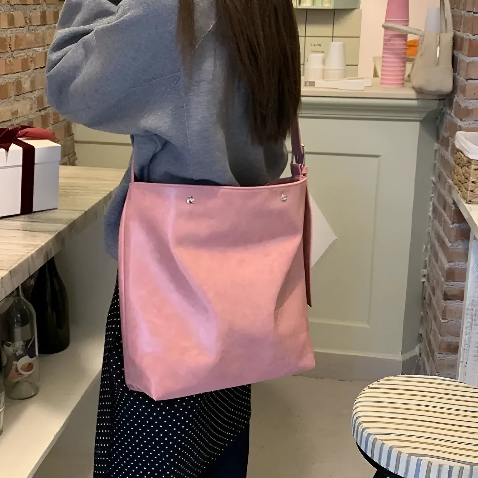 Corduroy one-shoulder commuter bag with PU lining in pink or brown, showing 39cm length dimensions