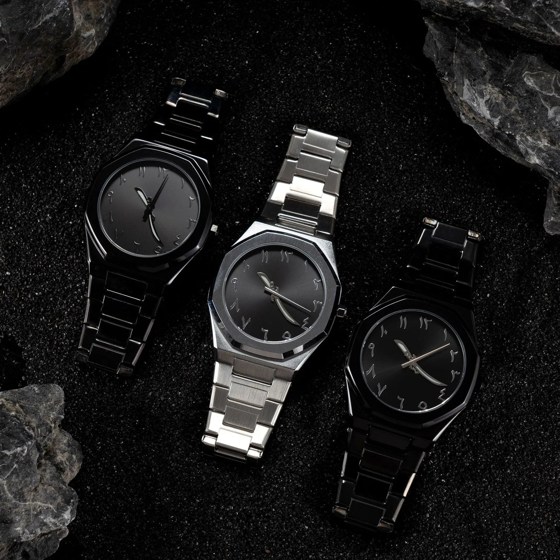 Men's steel bracelet quartz watch in business style on a wrist.