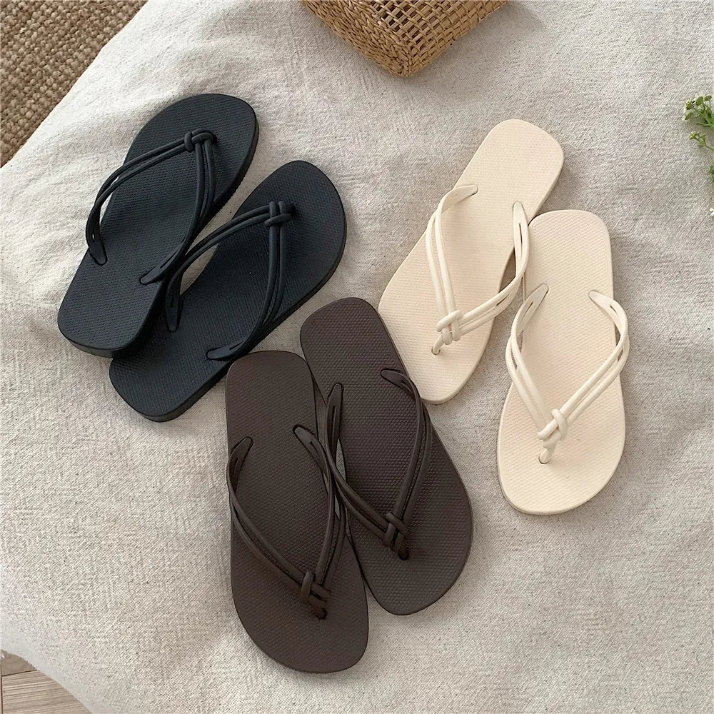 Men's closed-toe PVC flip flops in multiple colours on a plain background.