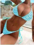 Women's lace-up front triangle bikini top and split bottoms in a choice of colours and patterns.