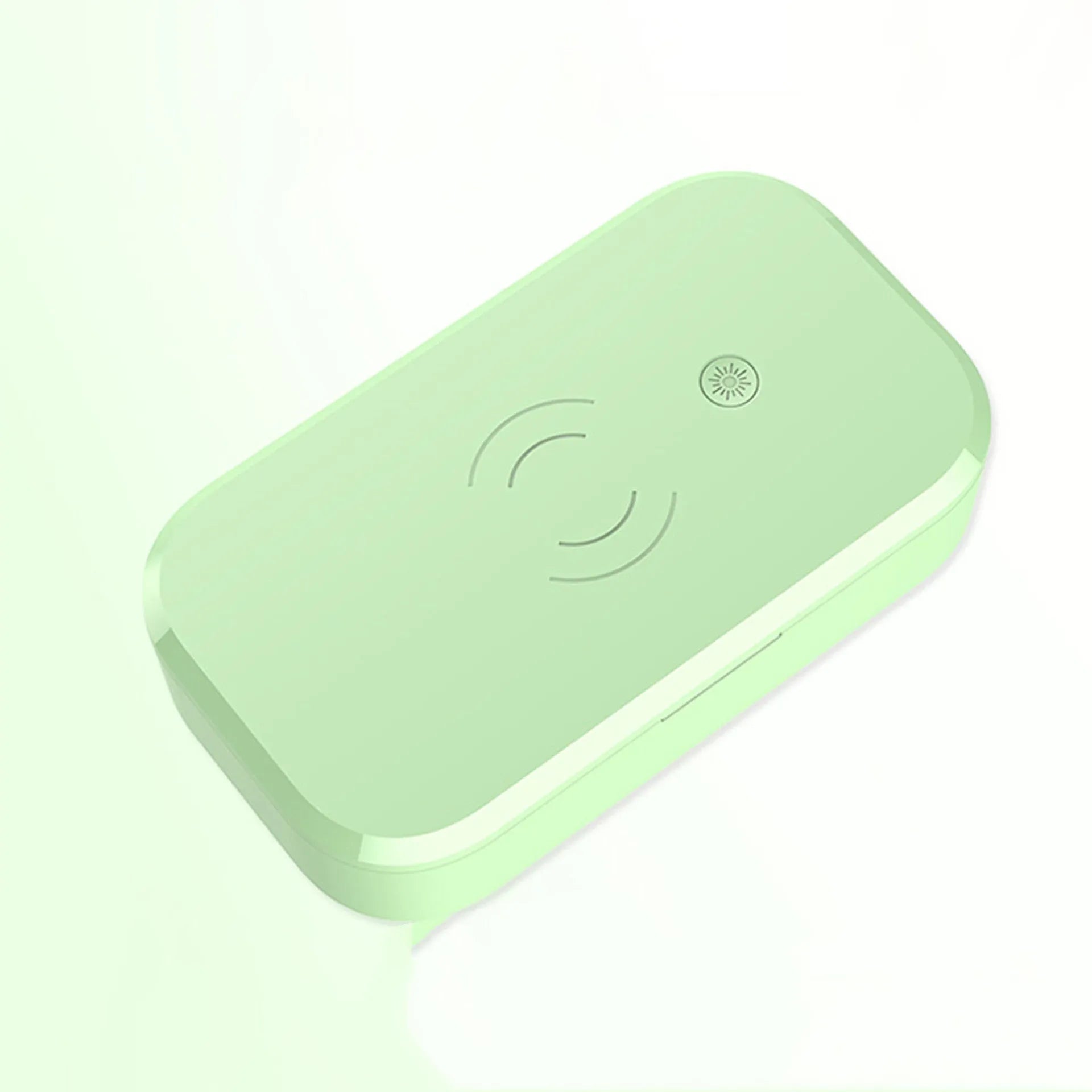 White ultraviolet disinfection box with wireless phone charging top and USB cable.