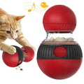 Rotating plastic cat toy with a super ball, designed for food dispensing and sound play.