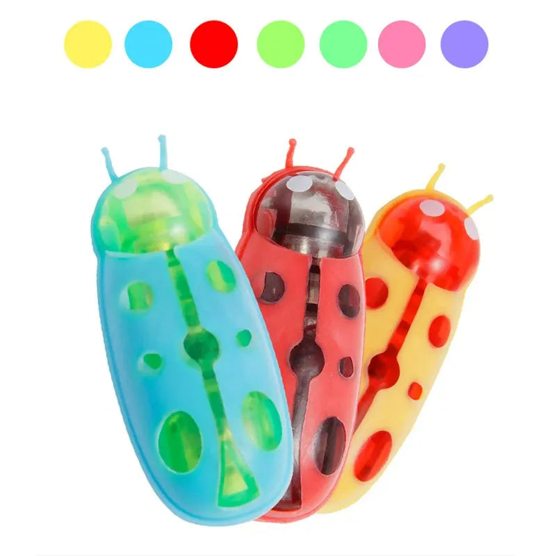 Electric bug cat toy with motorised walking motion and ladybird design