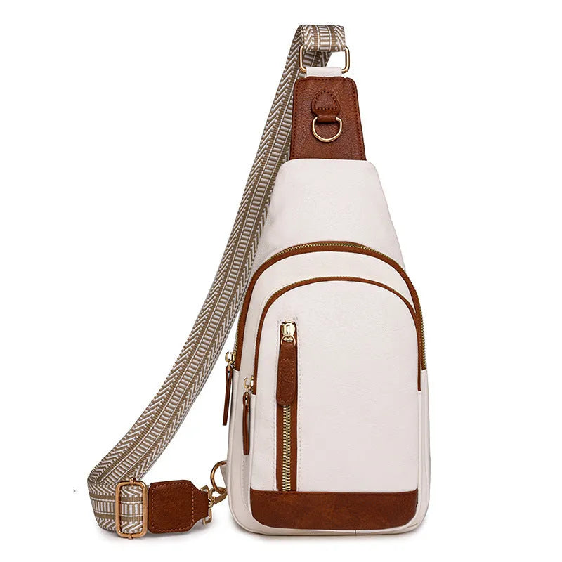 Women's small brown PU leather chest bag with open front pocket worn across chest