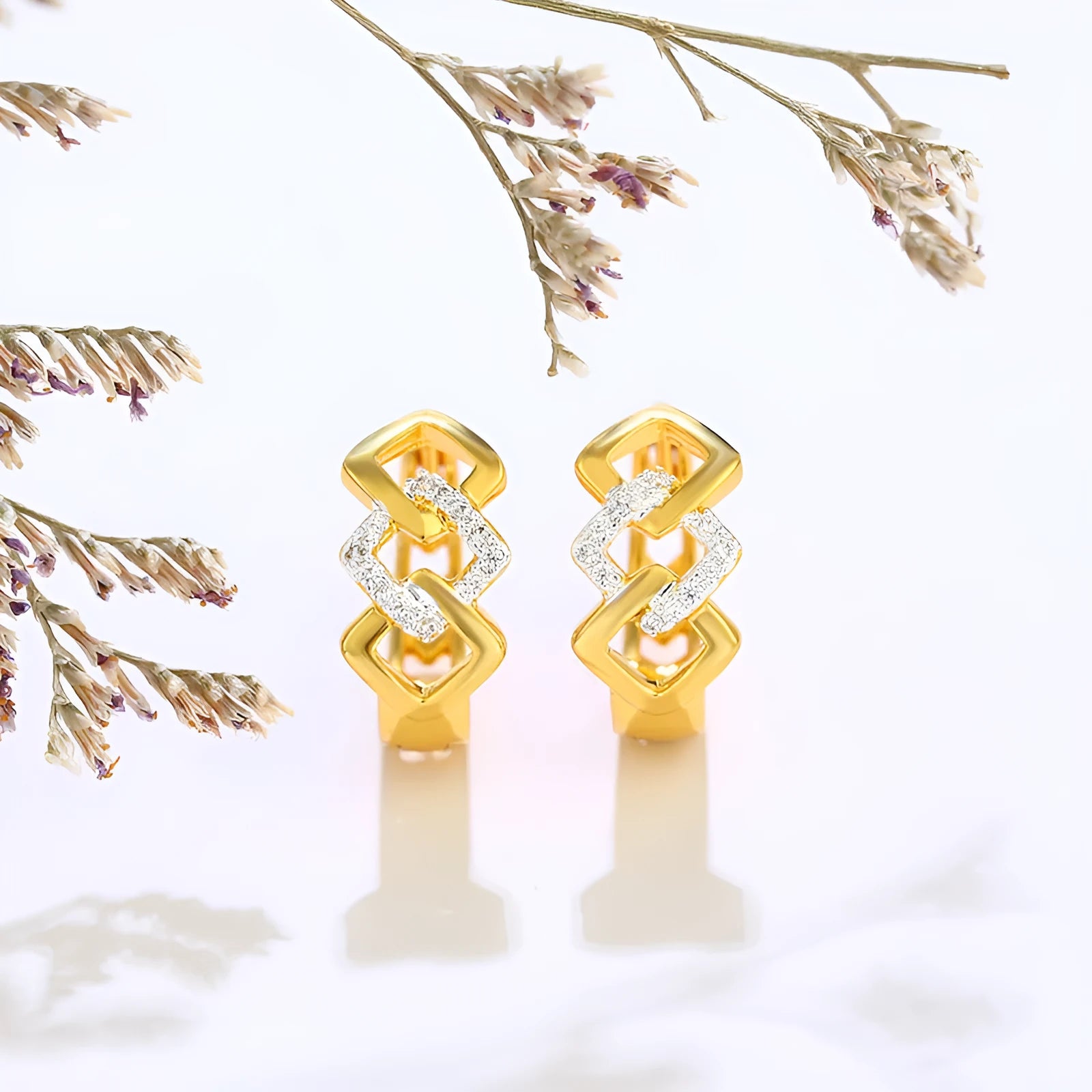 Gold geometric hollow-out clip-on earrings with colour separation electroplated finish