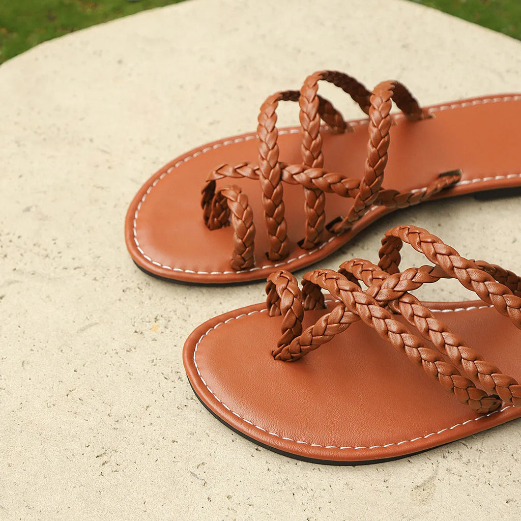 Women's white clip-toe woven Roman sandals with artificial pu upper and rubber sole