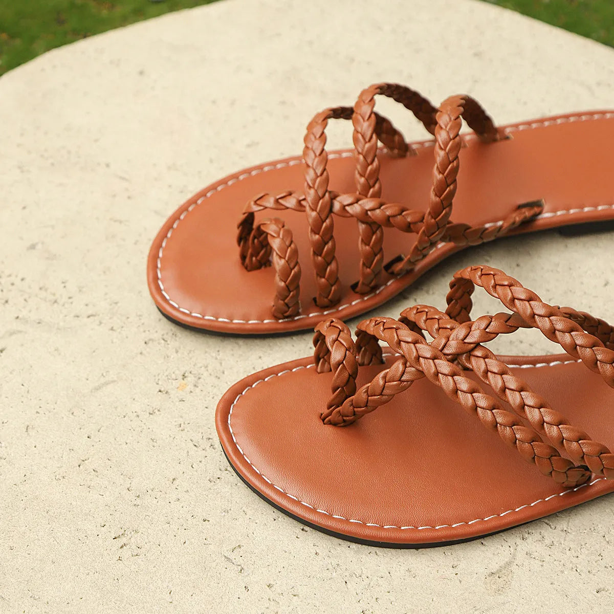 Women's white clip-toe woven Roman sandals with artificial pu upper and rubber sole