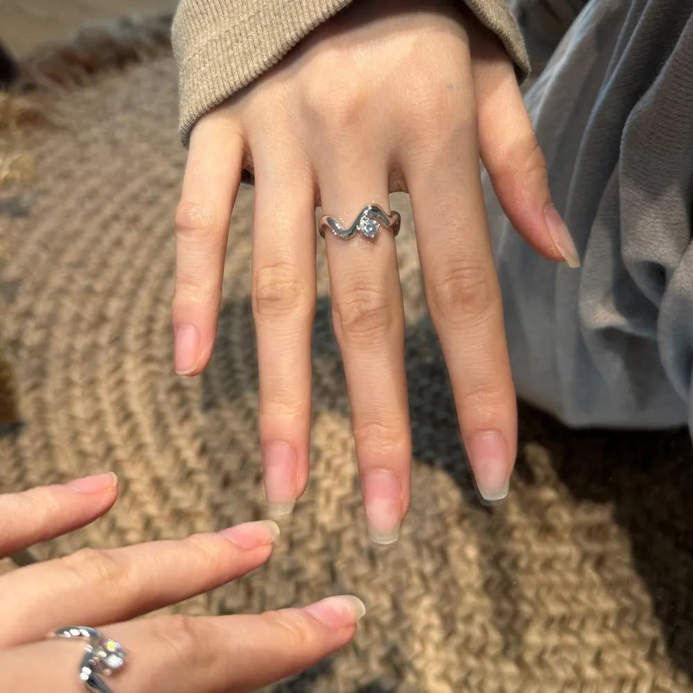 Women's metal single diamond smooth wave line open ring in silver electroplate finish
