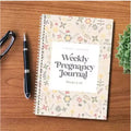 A5 pregnancy weekly diary notebook showing structured format for weekly entries