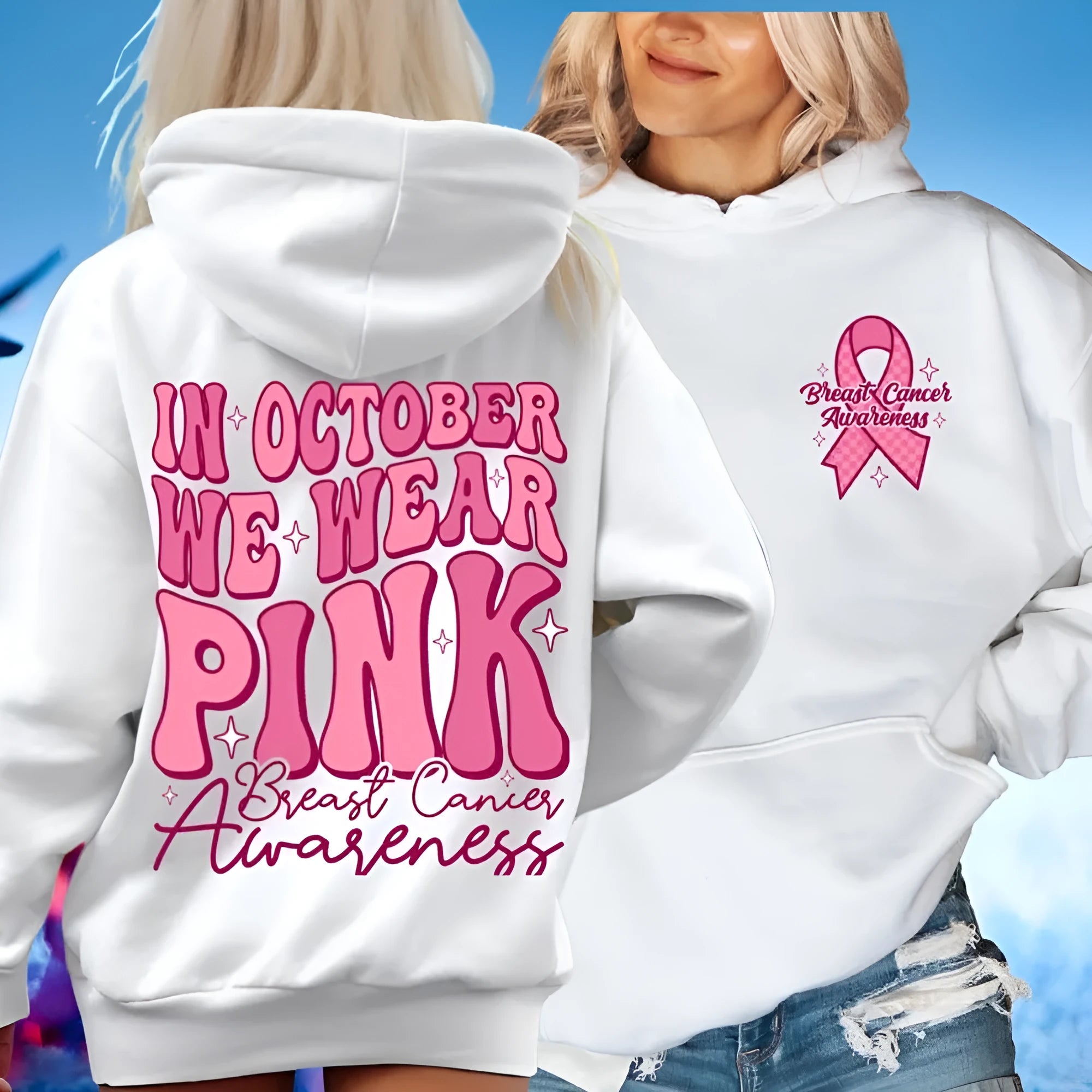 Women's pink breast cancer awareness pullover hoodie with retro graphic design and side seam pockets.