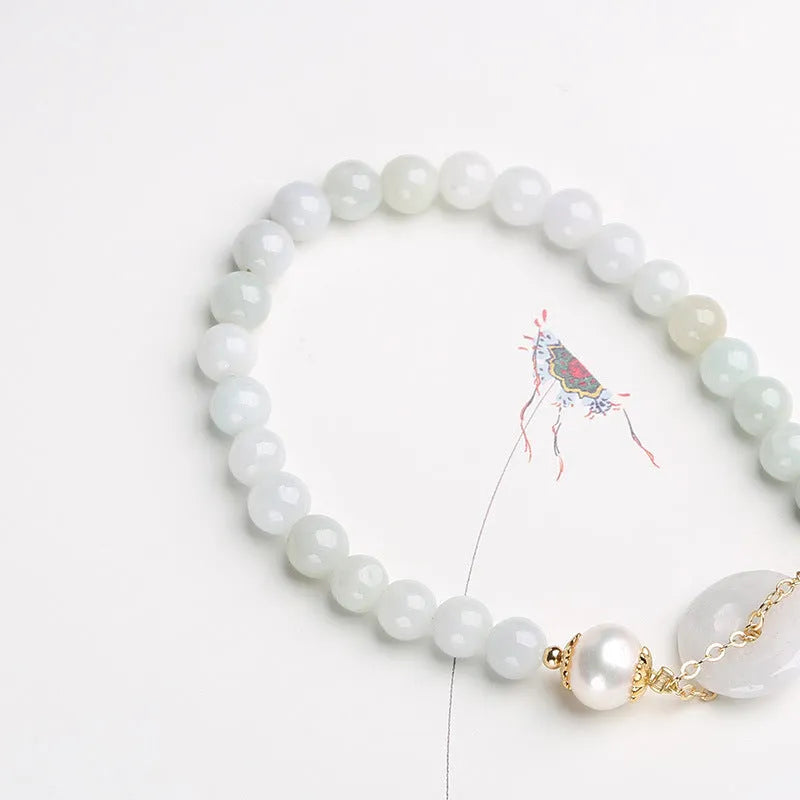 Emerald jade and pearl bracelet with peace symbol buckle on adjustable 20-22cm band