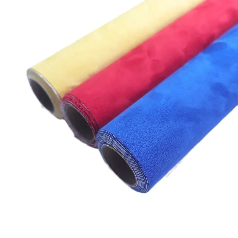 Self-adhesive leather suede sheet roll in multiple colour swatches showing black, brown, blue, and red.
