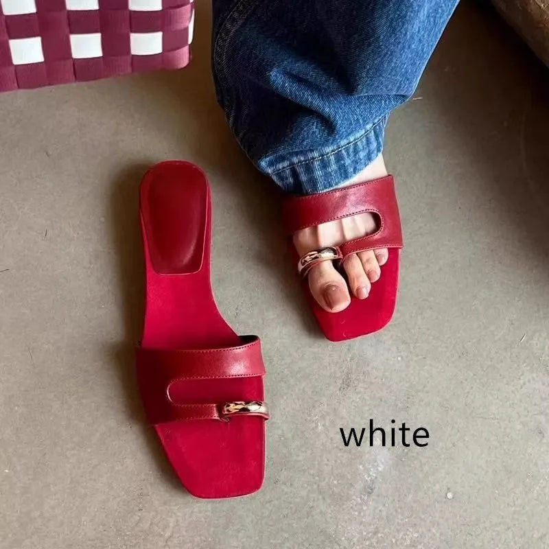 Women's plus size square toe outdoor slippers in leather with a rubber sole.