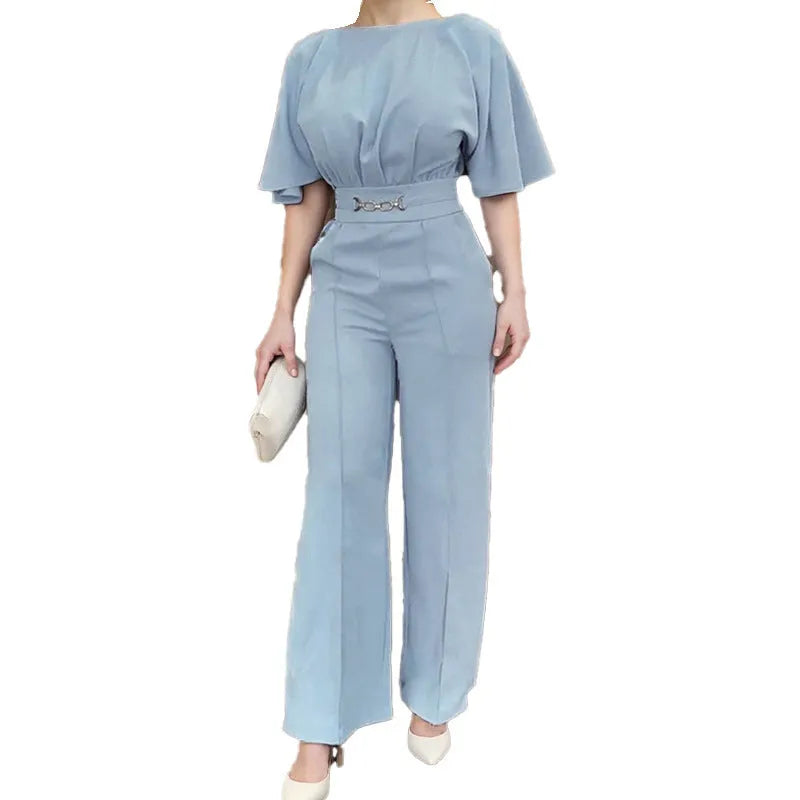 Blue polyester men's suit with long sleeve jacket and trousers on a hanger