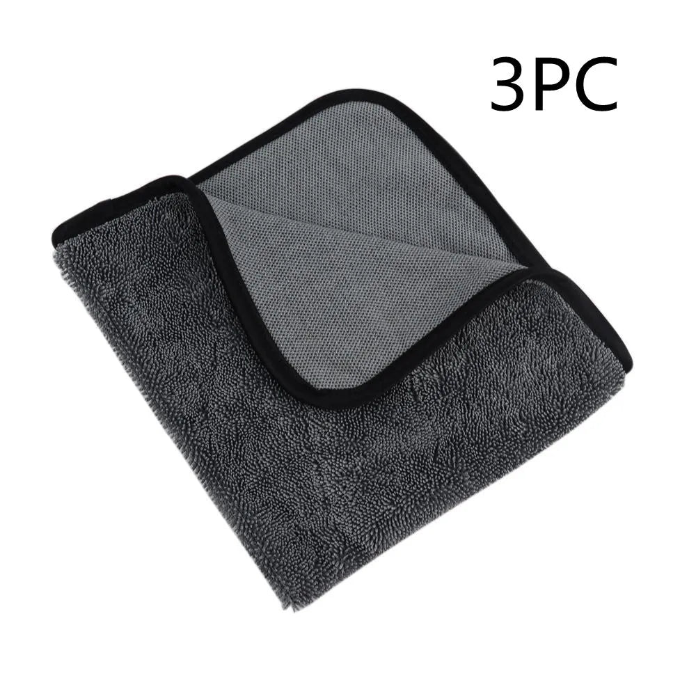 Grey microfiber car drying towel laid flat showing 40x40cm size.