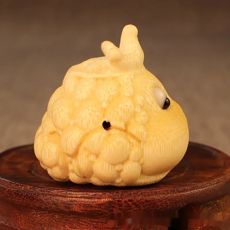 Solid bamboo carving of a Crown Princess toad ornament in cute style