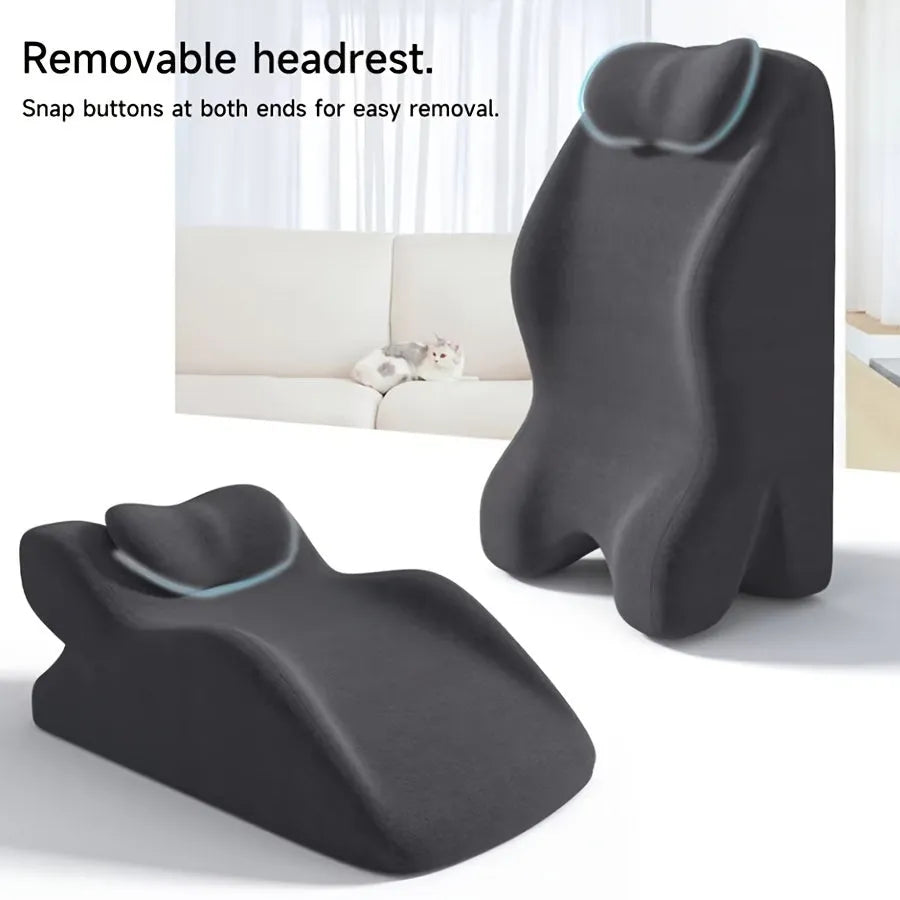 Ergonomic stomach sleeper pillow for reading in bed, shown in blue colour