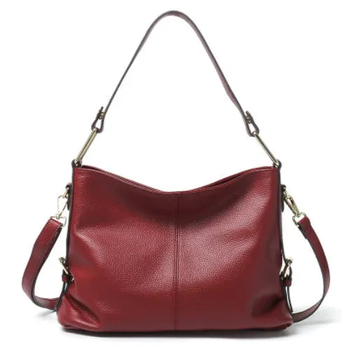 Genuine leather vertical square crossbody bag showing internal phone and document pockets