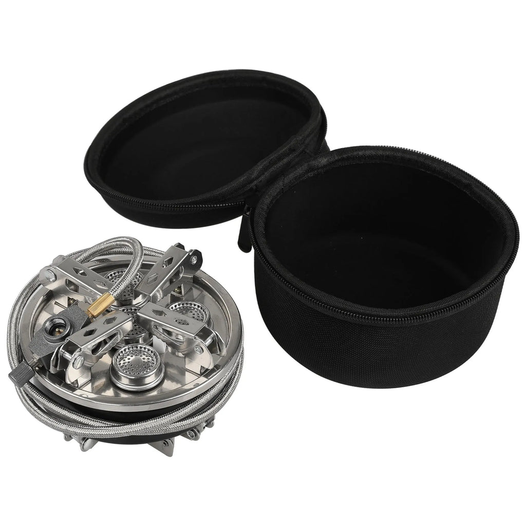 Silver coloured portable split stove made of stainless steel and copper with a long hose, shown folded for transport.