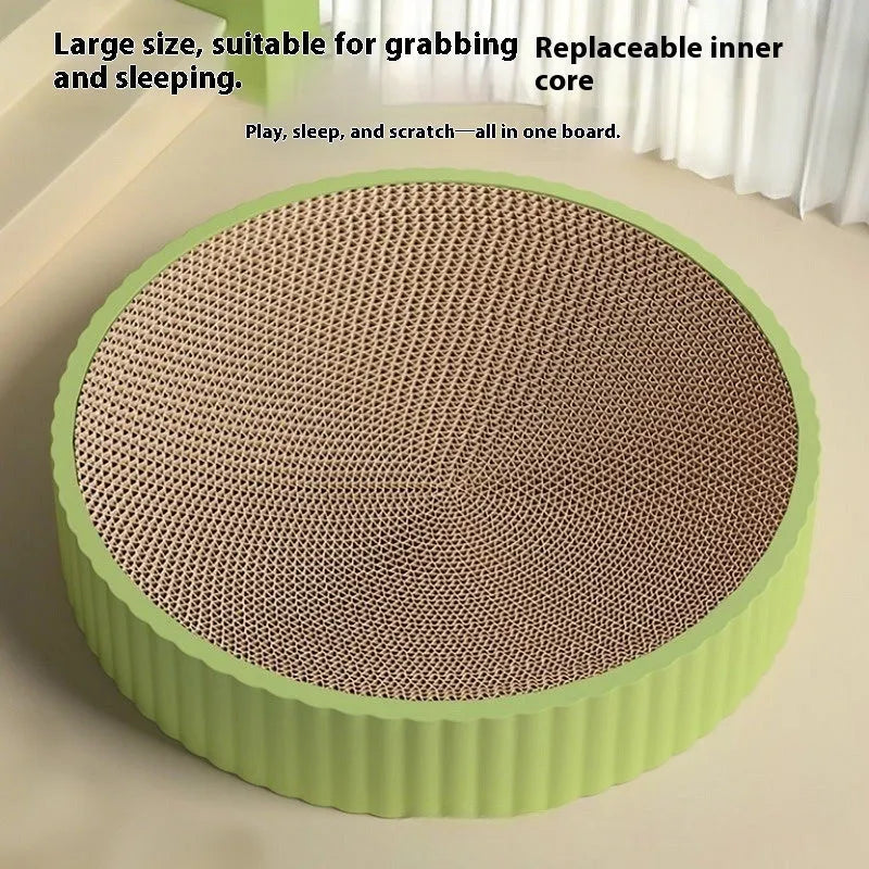 Round green cat scratching board with replaceable corrugated paper centre, 55cm diameter