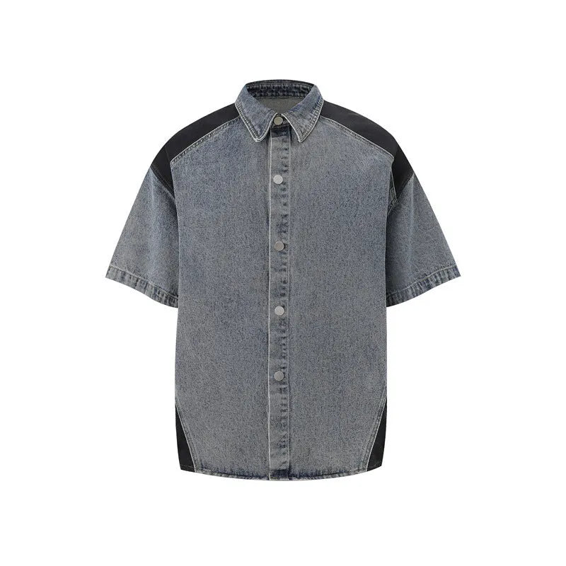 Retro washed blue denim short-sleeve jacket and matching trousers suit laid flat.