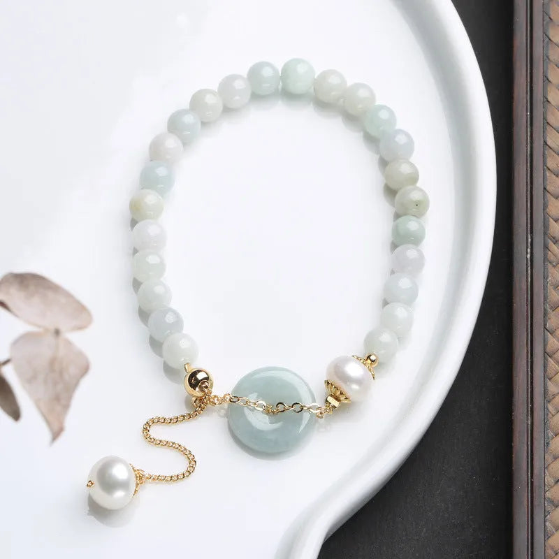 Emerald jade and pearl bracelet with peace symbol buckle on adjustable 20-22cm band