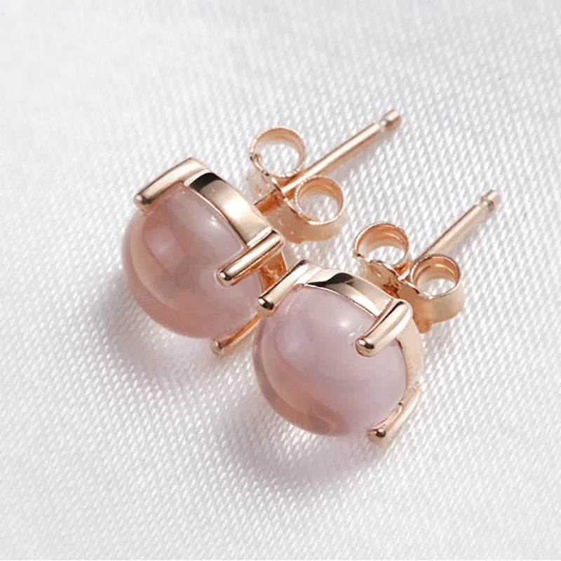 Rose gold drop shape synthetic quartz stud earrings with crystal inlay
