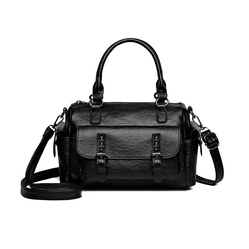 Vintage messenger bag in horizontal square shape showing contrast stitching details and shoulder strap