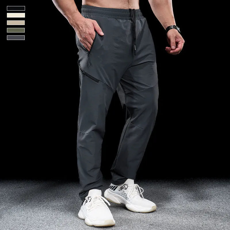 Men's waterproof quick-dry nylon exercise trousers in Army Green colour with mid waist design