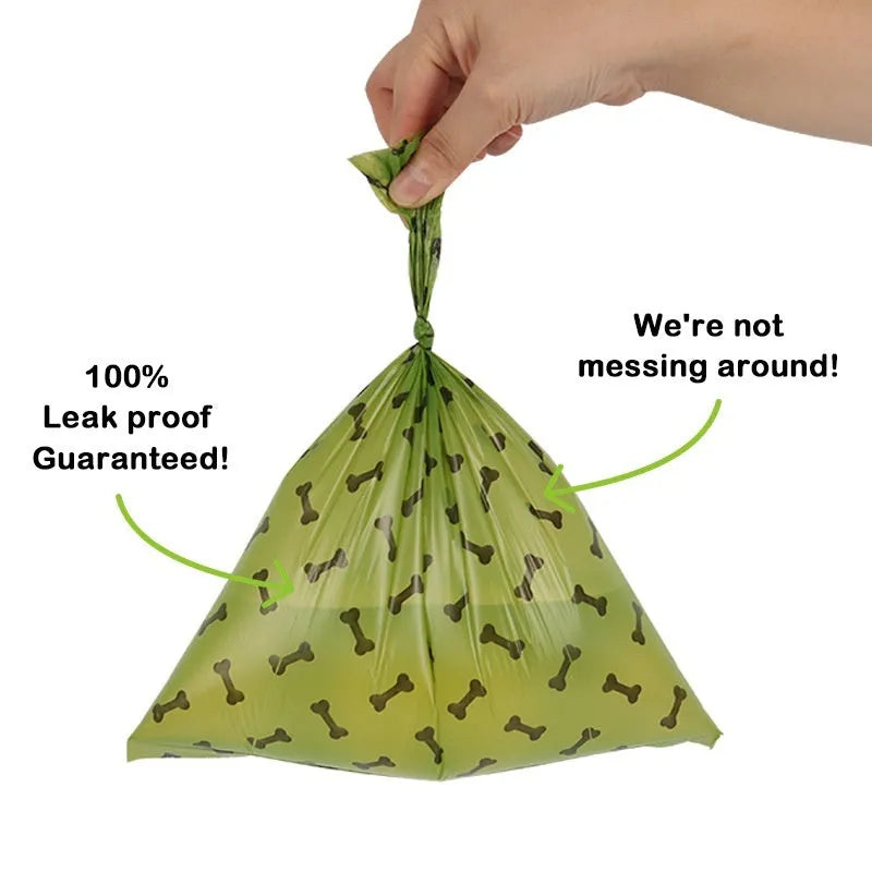 Military green degradable dog poop bags with black bone print, measuring 23 by 33 centimetres