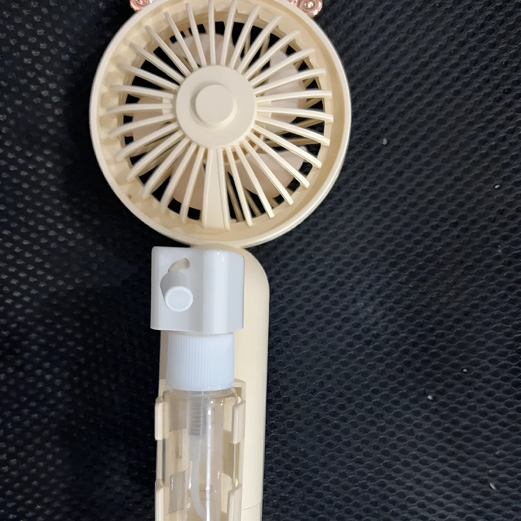 USB rechargeable plastic nozzle desk fan in apricot colour with compact 20cm width design