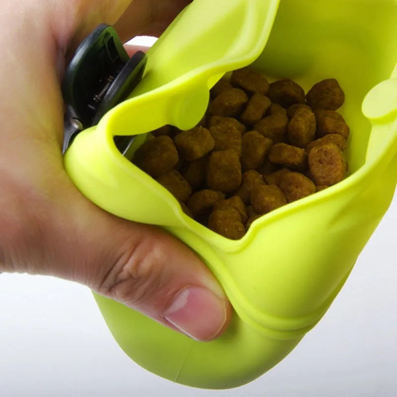Coloured silicone dog treat bag with clip and magnetic opening, shown with dog training treats.