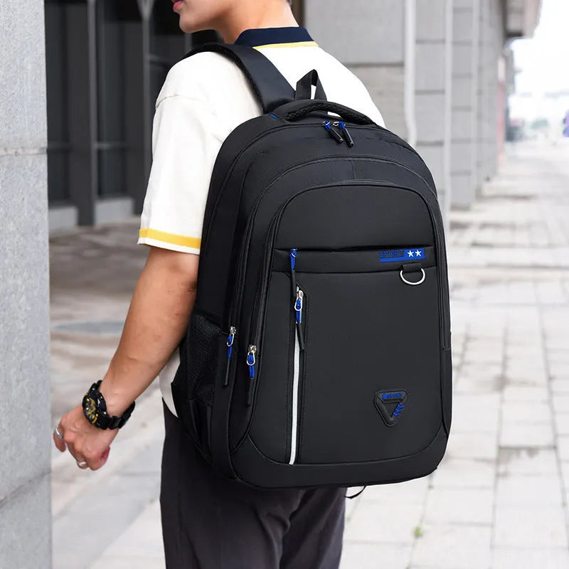 Men's Oxford cloth large capacity schoolbag with air pillow belt system in black, blue, green, or red colours