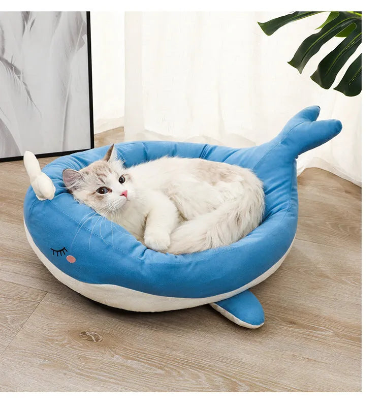 Blue duck-shaped fluffy pet sofa bed for small dogs and cats on a white background.