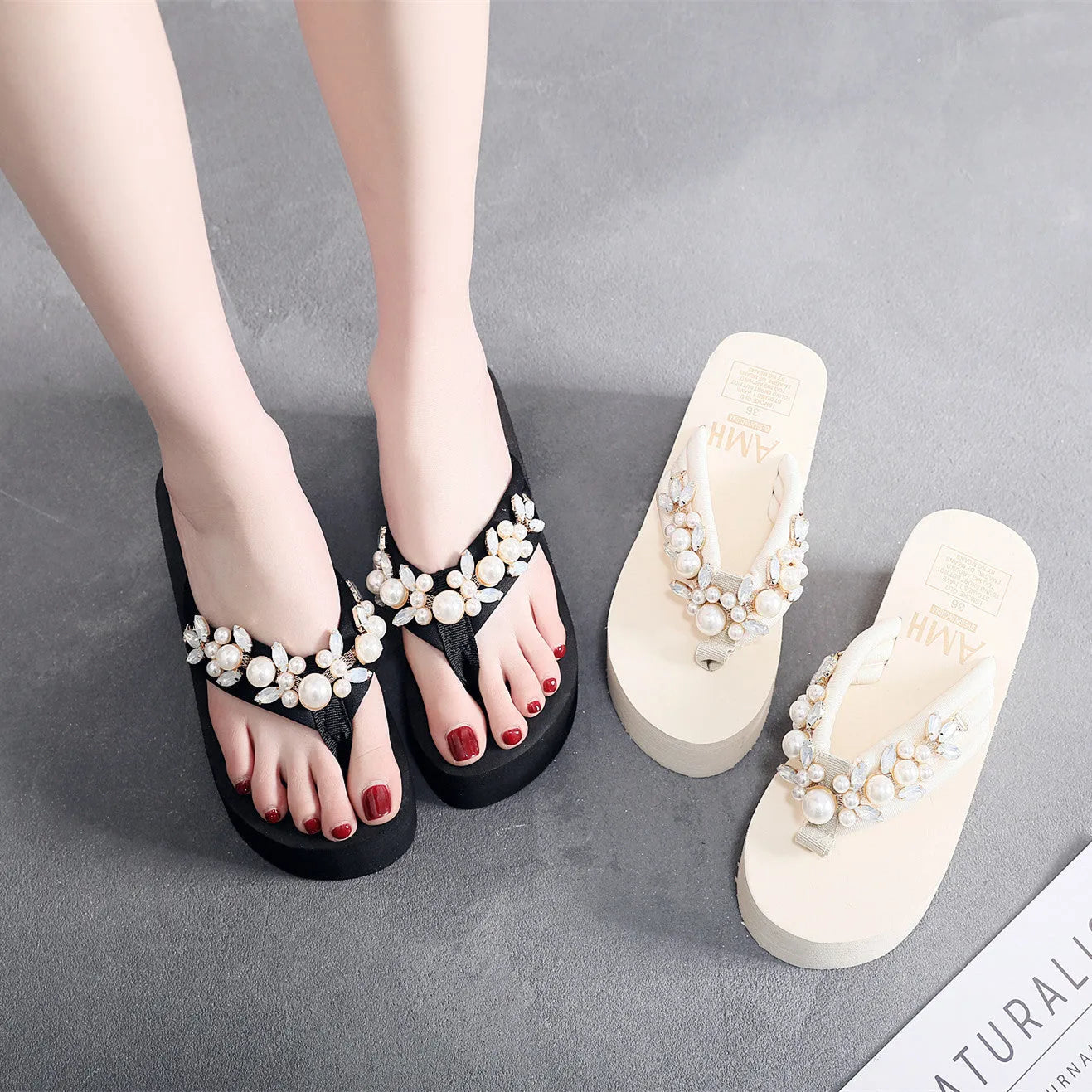 Women's high-heeled flip-flops with cotton cloth upper in black or beige colour, available in sizes 35 to 40.